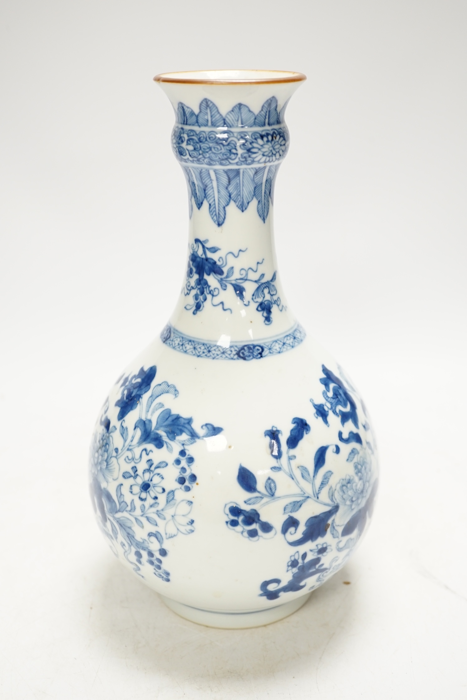 A 18th century Chinese blue and white bottle vase (guglet), 25cm. Condition - good